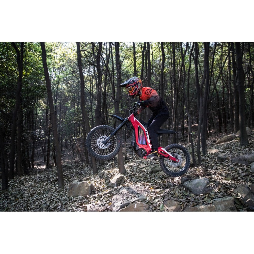 Surron Light Bee S eBike, jumping outdoor terrain, color: red